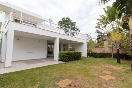 Casa de condomínio à venda com 434m², 4 quartos e 4 vagas Casa de condomínio à venda com 434m², 4 quartos e 4 vagasÁrea externa