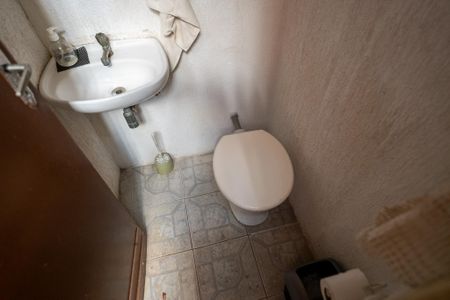 Casa à venda com 294m², 3 quartos e 4 vagasBanheiro área de serviço