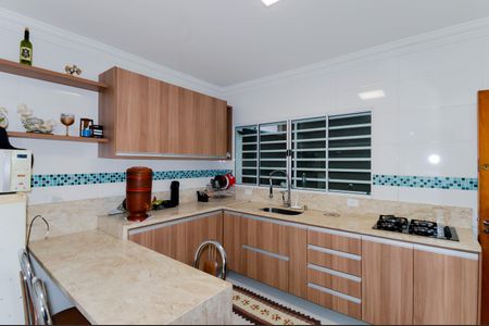 Casa à venda com 126m², 3 quartos e 3 vagas Casa à venda com 126m², 3 quartos e 3 vagasCozinha