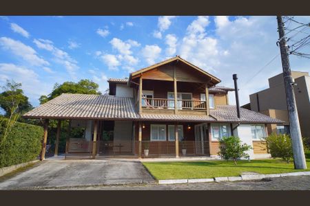 Casa de condomínio para alugar com 359m², 3 quartos e 2 vagasFachada casa