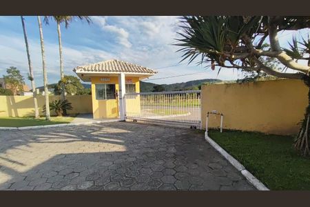 Casa de condomínio para alugar com 359m², 3 quartos e 2 vagasFachada