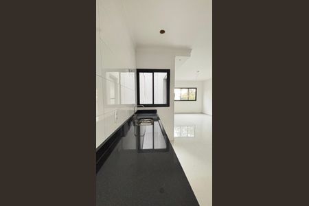 Casa à venda com 111m², 2 quartos e 2 vagas Casa à venda com 111m², 2 quartos e 2 vagasCozinha