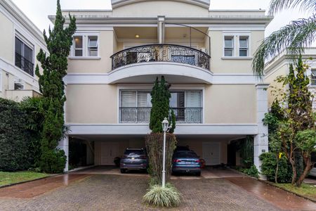 Casa de condomínio para alugar com 380m², 4 quartos e 4 vagas Casa de condomínio para alugar com 380m², 4 quartos e 4 vagasFachada