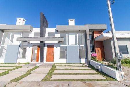 Casa de condomínio à venda com 92m², 3 quartos e 1 vaga Casa de condomínio à venda com 92m², 3 quartos e 1 vagaFachada