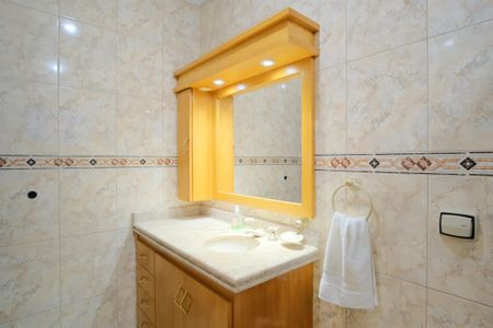 Casa à venda com 300m², 4 quartos e 4 vagasBanheiro da Suíte 1