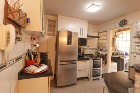 Casa de condomínio à venda com 130m², 3 quartos e 2 vagas Casa de condomínio à venda com 130m², 3 quartos e 2 vagasCozinha e Área de Serviço