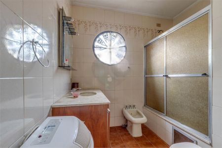 Casa à venda com 329m², 4 quartos e 3 vagas
