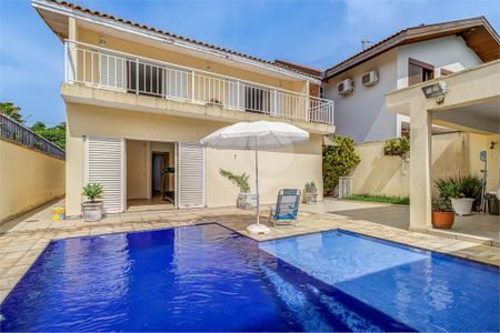 Casa de condomínio à venda com 329m², 4 quartos e 3 vagas