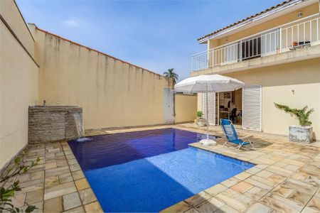 Casa de condomínio à venda com 329m², 4 quartos e 3 vagas