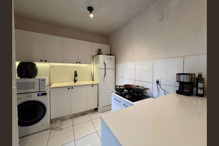 Apartamento à venda com 48m², 2 quartos e 1 vaga Apartamento à venda com 48m², 2 quartos e 1 vagaCozinha e Área de Serviço