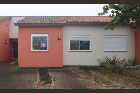 Casa de condomínio à venda com 55m², 2 quartos e 2 vagasFachada