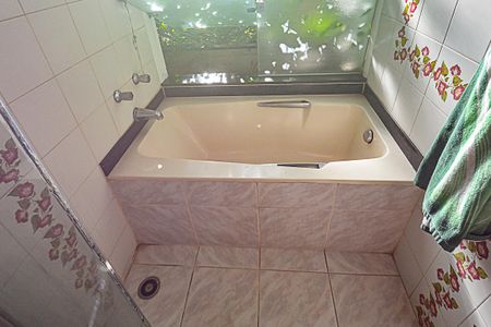 Casa à venda com 541m², 4 quartos e 2 vagas Casa à venda com 541m², 4 quartos e 2 vagasBanheiro da Suíte 4