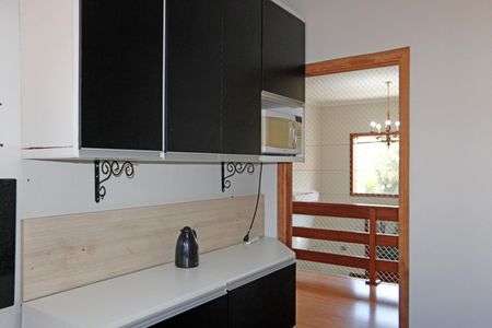 Casa de condomínio para alugar com 300m², 4 quartos e 3 vagasCozinha e Área de Serviço