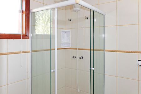 Casa de condomínio para alugar com 300m², 4 quartos e 3 vagasBanheiro da Suíte 1