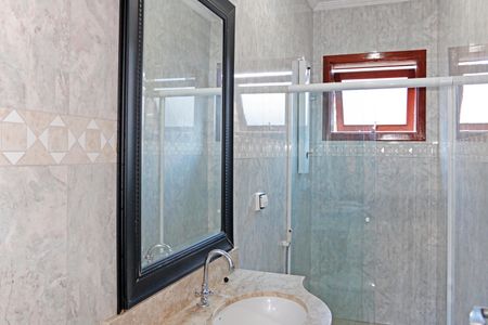 Casa de condomínio para alugar com 300m², 4 quartos e 3 vagasBanheiro 1