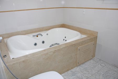 Casa de condomínio para alugar com 300m², 4 quartos e 3 vagasBanheiro da Suíte 2