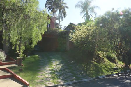 Casa de condomínio para alugar com 323m², 4 quartos e 5 vagasFachada