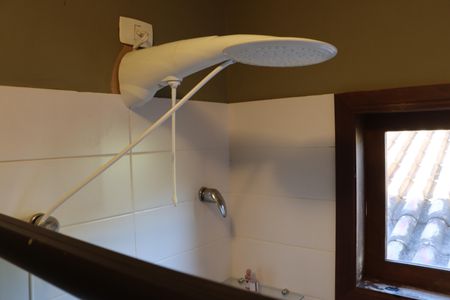 Casa de condomínio para alugar com 323m², 4 quartos e 5 vagasBanheiro da Suíte 3