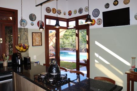 Casa de condomínio para alugar com 323m², 4 quartos e 5 vagasCozinha