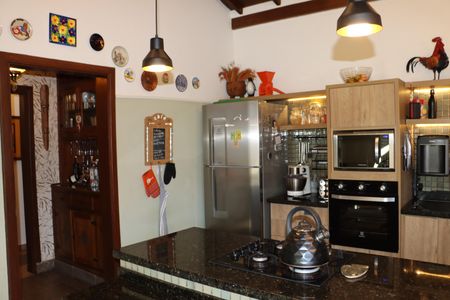 Casa de condomínio para alugar com 323m², 4 quartos e 5 vagasCozinha