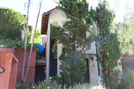 Casa de condomínio para alugar com 323m², 4 quartos e 5 vagasFachada