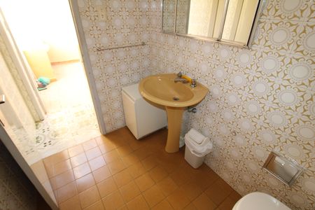 Casa à venda com 210m², 3 quartos e 4 vagasBanheiro