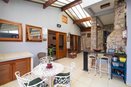 Casa à venda com 120m², 3 quartos e 2 vagas Casa à venda com 120m², 3 quartos e 2 vagasVaranda com Churrasqueira