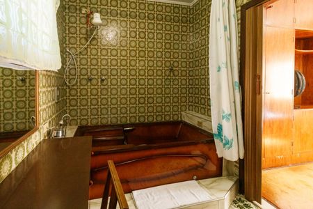 Casa à venda com 350m², 4 quartos e 2 vagas Casa à venda com 350m², 4 quartos e 2 vagasBanheiro da Suíte
