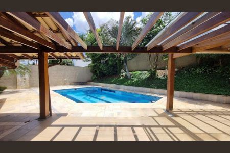 Casa de condomínio à venda com 570m², 5 quartos e 6 vagas