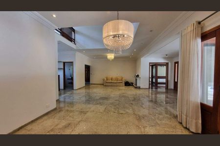 Casa de condomínio à venda com 570m², 5 quartos e 6 vagas