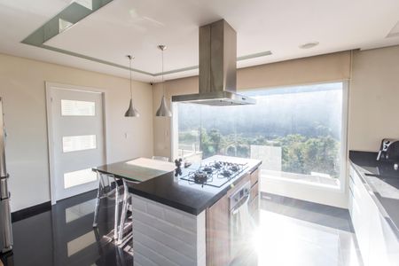 Casa de condomínio à venda com 385m², 4 quartos e 4 vagas Casa de condomínio à venda com 385m², 4 quartos e 4 vagasCozinha