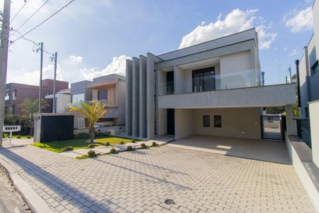Casa de condomínio para alugar com 380m², 4 quartos e 4 vagasFachada