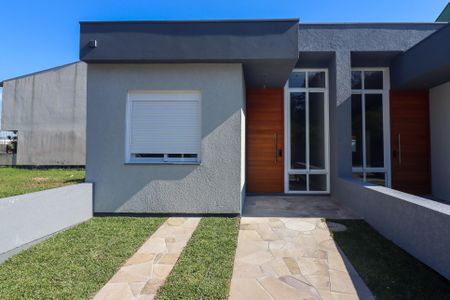 Casa à venda com 66m², 2 quartos e 1 vaga Casa à venda com 66m², 2 quartos e 1 vagaFachada