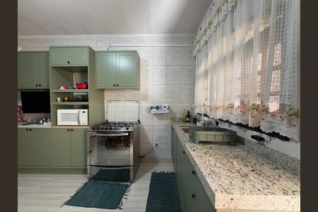 Casa à venda com 147m², 3 quartos e 3 vagas Casa à venda com 147m², 3 quartos e 3 vagasCozinha