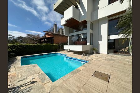 Casa de condomínio para alugar com 400m², 4 quartos e 4 vagas Casa de condomínio para alugar com 400m², 4 quartos e 4 vagasÁrea comum - Piscina