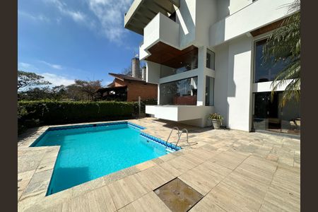 Casa de condomínio para alugar com 400m², 4 quartos e 4 vagas Casa de condomínio para alugar com 400m², 4 quartos e 4 vagasÁrea comum - Piscina