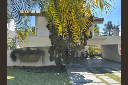 Casa de condomínio para alugar com 400m², 4 quartos e 4 vagas Casa de condomínio para alugar com 400m², 4 quartos e 4 vagasFachada