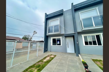 Casa à venda com 67m², 2 quartos e 1 vaga Casa à venda com 67m², 2 quartos e 1 vagaFachada