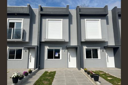 Casa à venda com 67m², 2 quartos e 1 vaga Casa à venda com 67m², 2 quartos e 1 vagaFachada