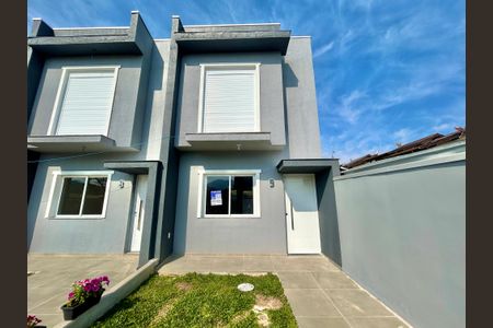 Casa à venda com 67m², 2 quartos e 1 vaga Casa à venda com 67m², 2 quartos e 1 vagaFachada