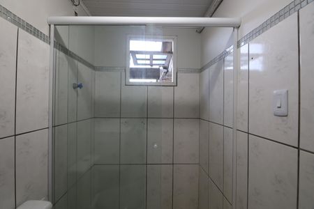 Casa à venda com 130m², 4 quartos e 2 vagasBanheiro/casa fundos