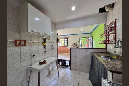 Casa de condomínio à venda com 150m², 2 quartos e 2 vagasCozinha e Área de Serviço