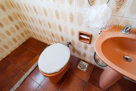 Casa de condomínio à venda com 235m², 4 quartos e 2 vagasBanheiro de Serviço