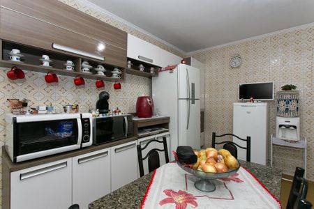 Casa à venda com 138m², 3 quartos e 2 vagas Casa à venda com 138m², 3 quartos e 2 vagasCozinha