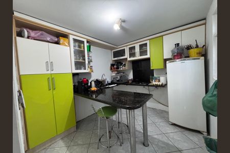 Casa à venda com 131m², 2 quartos e 2 vagas Casa à venda com 131m², 2 quartos e 2 vagasCozinha