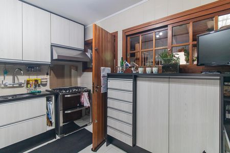 Casa de condomínio à venda com 126m², 3 quartos e 2 vagasCozinha e Área de Serviço