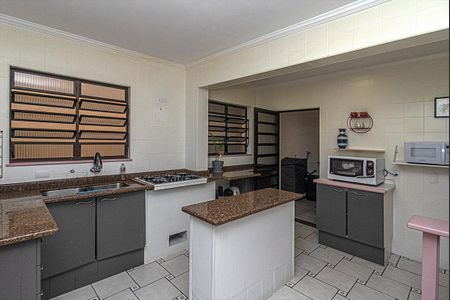 Casa à venda com 160m², 4 quartos e 2 vagas Casa à venda com 160m², 4 quartos e 2 vagasCozinha