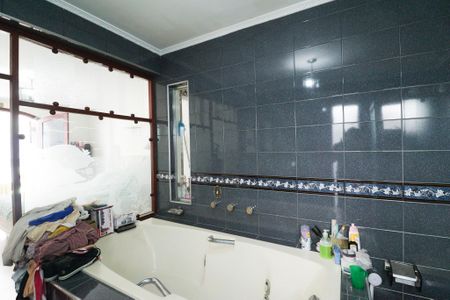 Casa à venda com 350m², 4 quartos e 2 vagas Casa à venda com 350m², 4 quartos e 2 vagasBanheiro da Suíte 4