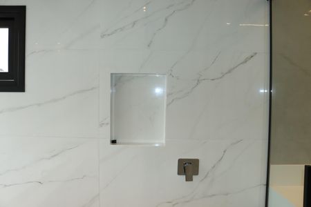 Casa de condomínio para alugar com 484m², 4 quartos e 3 vagasBanheiro da Suíte 1