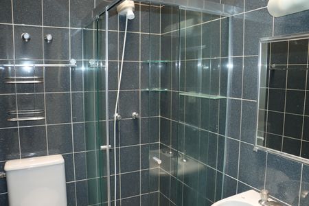 Casa de condomínio para alugar com 320m², 3 quartos e 4 vagasBanheiro da Suíte 3